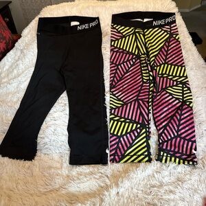 Nike Pro Black and Pink-Yellow Geometric Leggings 2 pairs